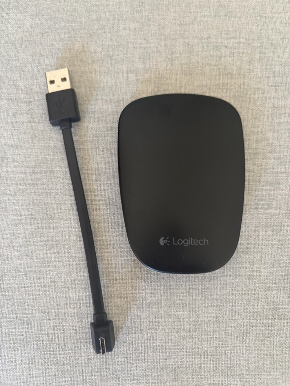 Logitech Black Slim Wireless Mouse with USB Charging Cable